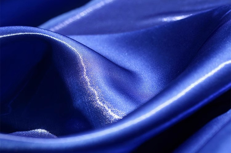 Lustre Flow Fabric – High-Gloss Reflective Textile