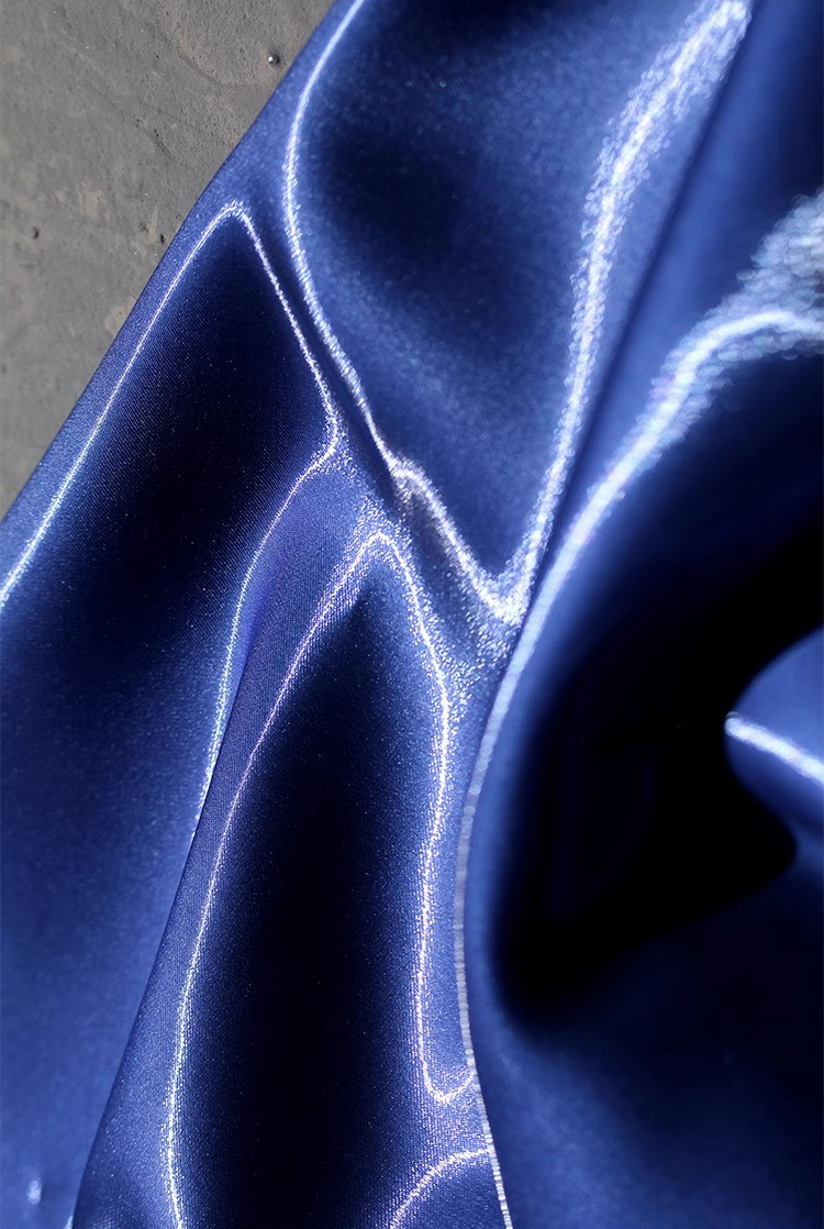 Lustre Flow Fabric – High-Gloss Reflective Textile