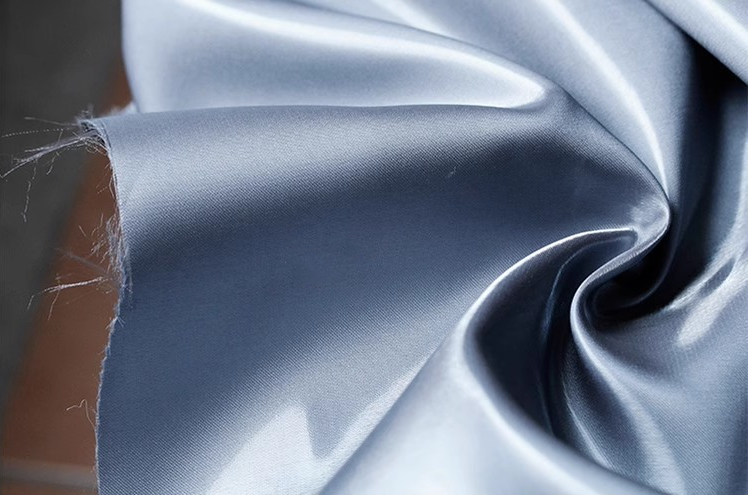 Lustre Flow Fabric – High-Gloss Reflective Textile