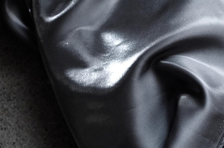 Lustre Flow Fabric – High-Gloss Reflective Textile