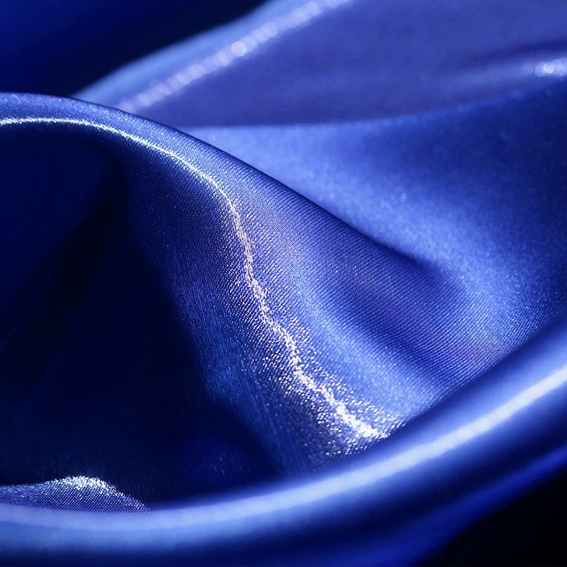 Lustre Flow Fabric – High-Gloss Reflective Textile