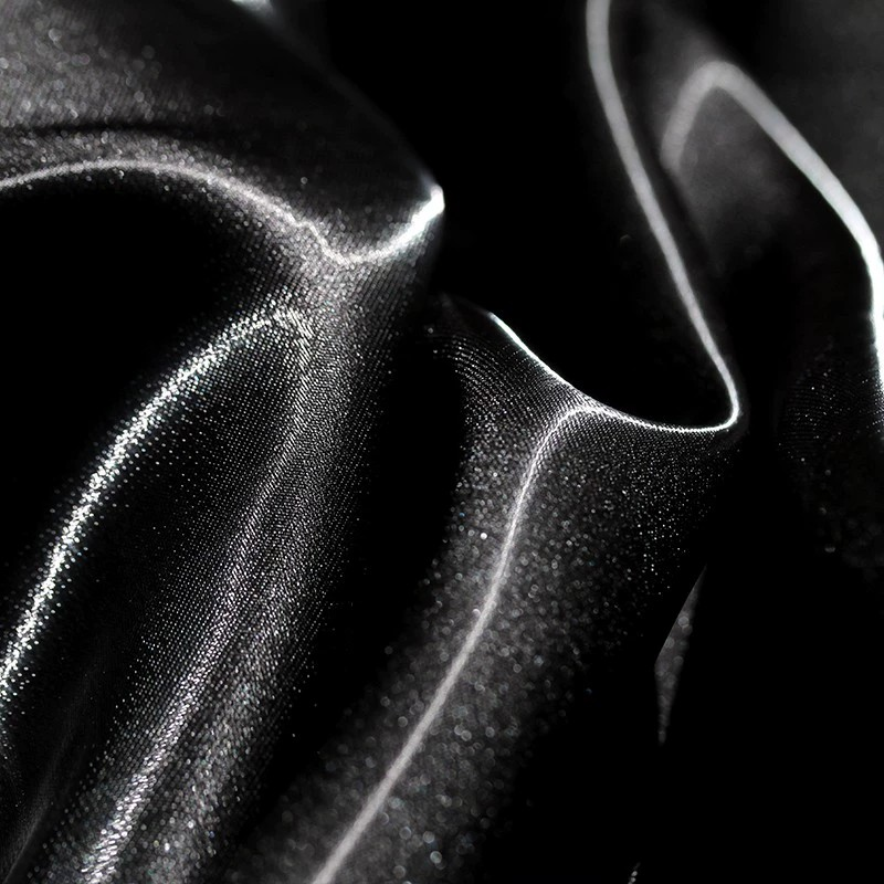 Lustre Flow Fabric – High-Gloss Reflective Textile