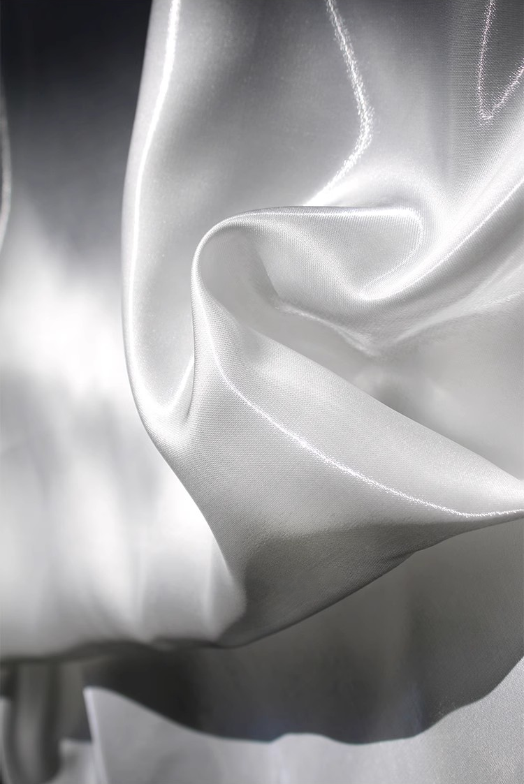 Lustre Flow Fabric – High-Gloss Reflective Textile