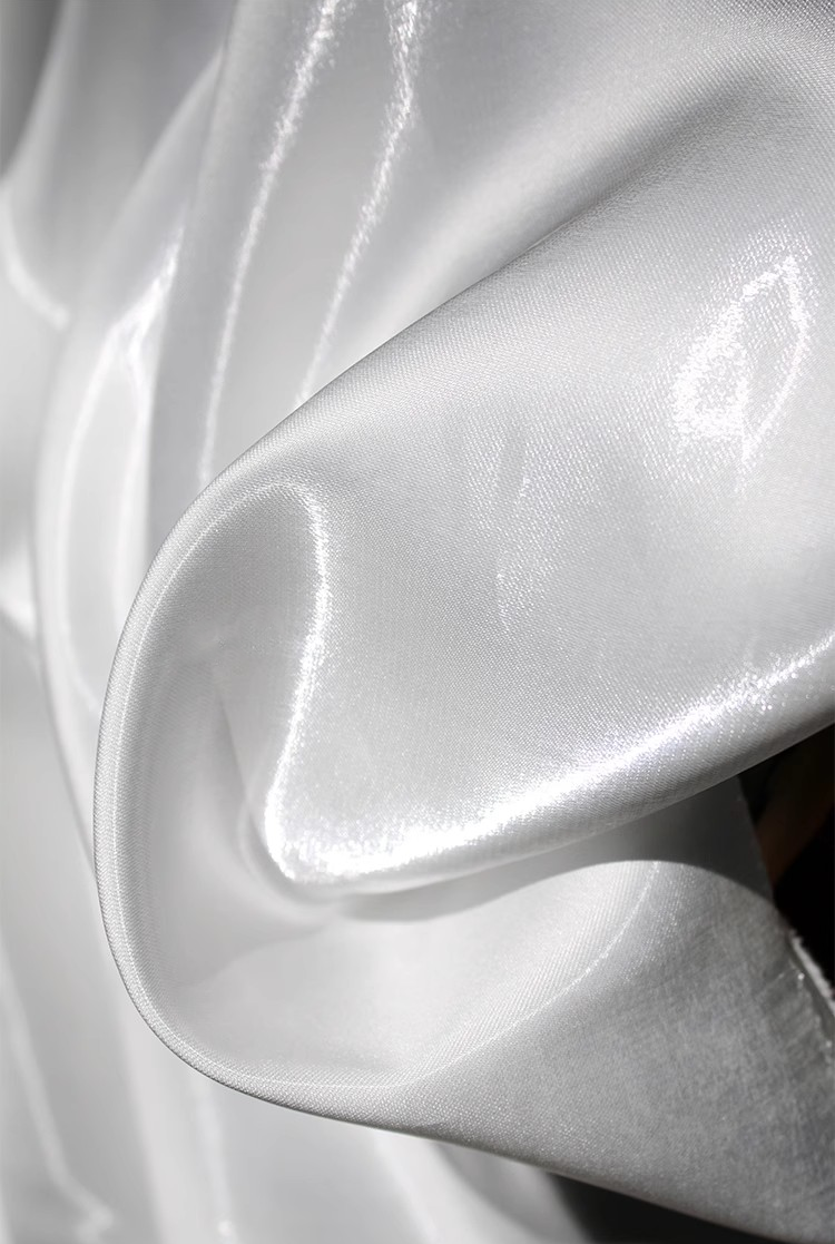 Lustre Flow Fabric – High-Gloss Reflective Textile