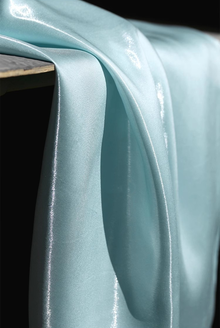 Lustre Flow Fabric – High-Gloss Reflective Textile