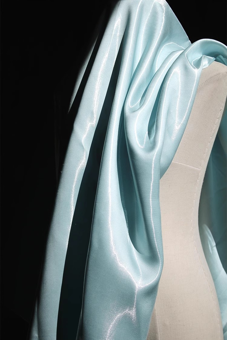 Lustre Flow Fabric – High-Gloss Reflective Textile