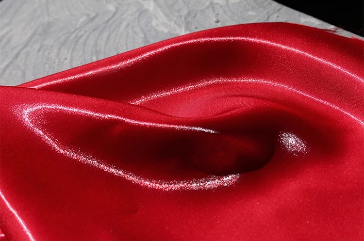 Lustre Flow Fabric – High-Gloss Reflective Textile