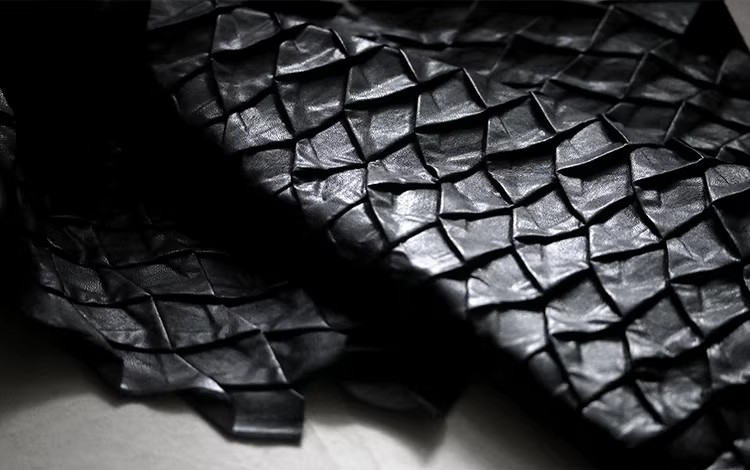 Revolutionary Black Leather-Texture Fabric – 3D Scaly Design