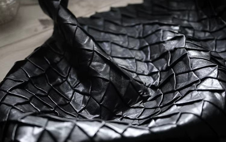 Revolutionary Black Leather-Texture Fabric – 3D Scaly Design